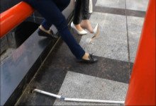 Two Women Care a Cute Little Boy Whille Playing Feet